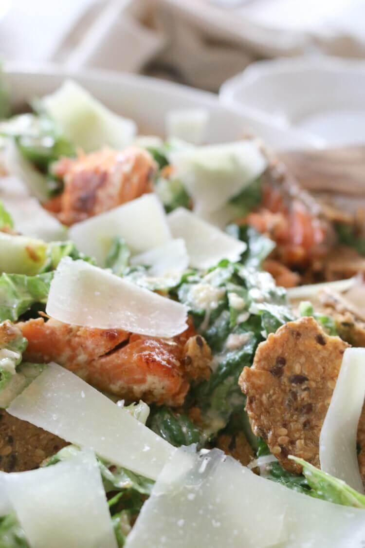 Healthy Caesar Salad -Caesar Salad is best enjoyed with real food ingredients and gluten free crackers for an extra crunch. Perfectly blended with salmon, chicken, or shrimp, it can be made into an easy meal!