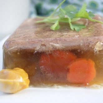How to Make Meat Jello (Aspic) - Meat jello or Aspic, as is formally called, is rich in amino acids and nutrients. It's naturally a great source of collagen and helps support bone, teeth and joint health. It's served as an appetizer with dijon mustard and rye bread. 