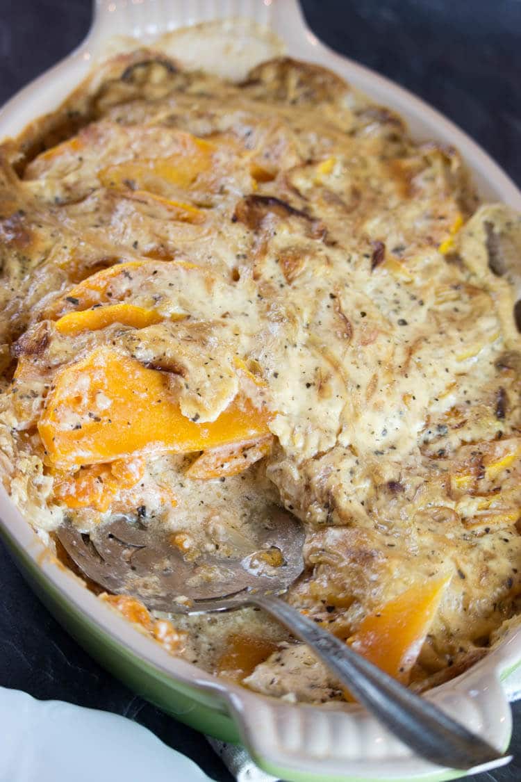 Scalloped Butternut Squash with Caramelized Onions Cream -Thinly sliced butternut squash is enveloped in a sea of caramelized onions and garlicky cream sauce. This side dish is loaded with amazing aroma and delicious flavors. #glutenfree #realfood #holidays
