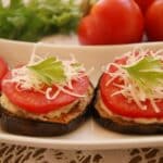 Roasted Eggplant and Tomato Appetizer with garlicky mayo center.