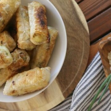 Spring Rolls with Rice & Eggs - These Spring Rolls with Rice and Eggs makes a fun and filling appetizer. Stuffed with fragrant basmati rice, hard boiled eggs and garden green onions. Cooked in a healthy fat, you won't be able to stop at just one. 