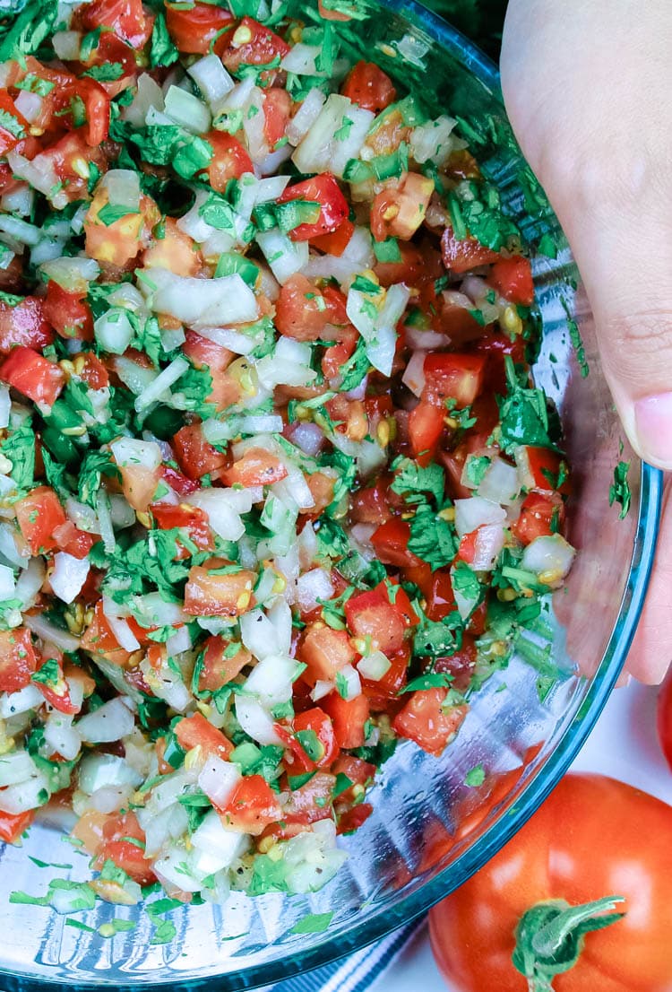 Wild Fermented Salsa - Fermented Tomato Salsa is a tangy and gut-healing version of Pico de Gallo. With only 5 ingredients and naturally Paleo, Whole30, and Low Carb, this will be your favorite condiment all season long. #ferment #healthy