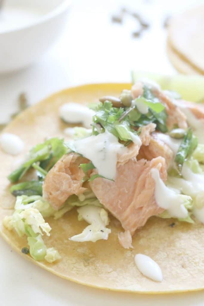 Seared Salmon Tacos with Asparagus Scallion Salsa and Lime Yogurt - these gluten free fish tacos are delicious and easy to make.