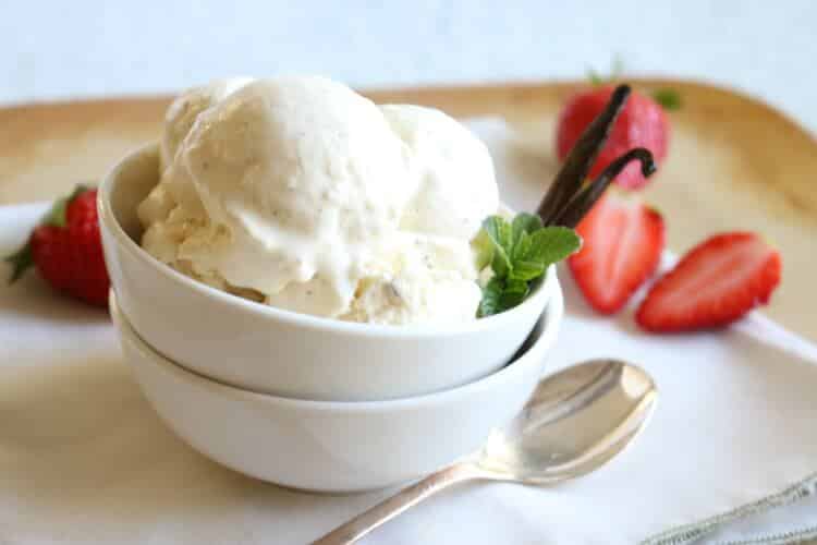 3 Ingredient Vanilla Bean Ice Cream - This Paleo treat is rich in healthy dairy free fats and loaded with vanilla bean specks. Made with coconut milk. 