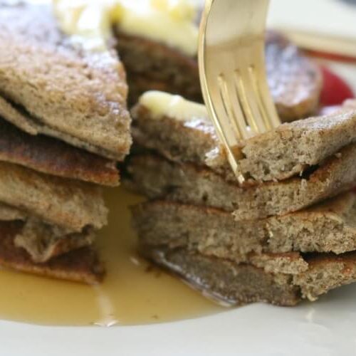 Gluten Free Sourdough Pancakes - These Gluten Free Sourdough Pancakes are rich in tangy buckwheat flavor and delicious. Smother with pastured butter, favorite berries and real maple syrup.
