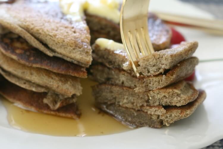 Gluten Free Sourdough Pancakes - These Gluten Free Sourdough Pancakes are rich in tangy buckwheat flavor and delicious. Smother with pastured butter, favorite berries and real maple syrup. 