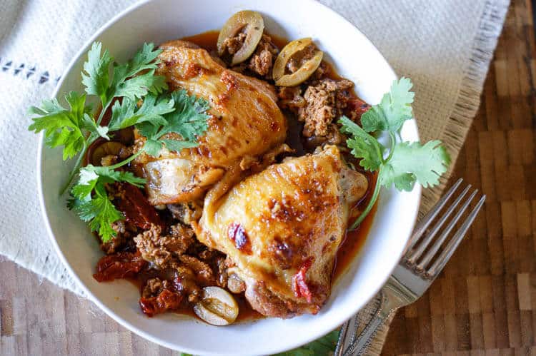 Instant Pot Citrus-Herb Basque Chicken is full of bold flavors from spicy chorizo, fragrant thyme, sweet orange juice and briny olives and sun-dried tomatoes. Enjoy with roasted vegetables or a bowl of rice.