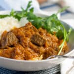 Lamb and Butternut Squash Curry made in the electric pressure cooker (Instant Pot) starts with tender grass-fed lamb, diced butternut squash, creamy coconut milk, and loads of curry flavor. Naturally #paleo, #whole30, and #GAPS for optimal nutrition. #instantpot #cleaneating