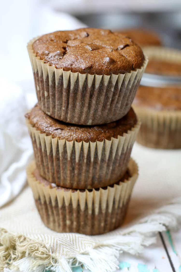 A stack of 3 double chocolate banana and flourless muffins.