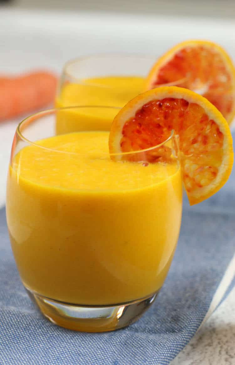 Immune Boosting Citrus Ginger Smoothie - Sweet citrus fruits are blended with carrots, ginger, turmeric, and a bit of coconut oil for healthy fats. Add in additional whole foods vitamin C for an extra boost. 
