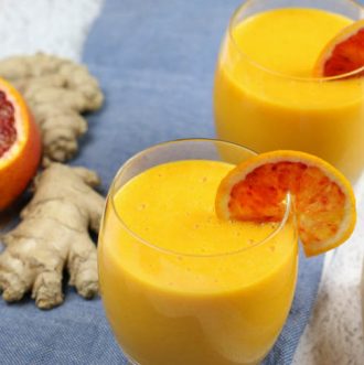 Immune Boosting Citrus Ginger Smoothie - Sweet citrus fruits are blended with carrots, ginger, turmeric, and a bit of coconut oil for healthy fats. Add in additional whole foods vitamin C for an extra boost.  #immuneboosting #healthysmoothie #citrus #ginger