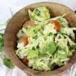 Avocado Cabbage Slaw - Enjoy this as a side salad next to a healthy protein or add some to your favorite tacos. It's rich in healthy fats, yummy crunch and loads of flavor. #lowcarb #paleo #whole30