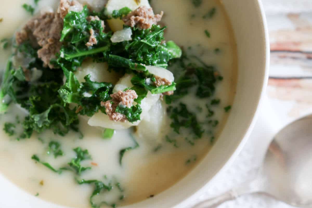 Instant Pot Ground Beef Kale Soup - This Ground Beef and Kale Soup is hearty and loaded with potatoes, ground beef and nutritious kale.  The best part is that this soup makes a quick and easy dinner with 4 minutes of cooking time. #instantpot #healthysoup