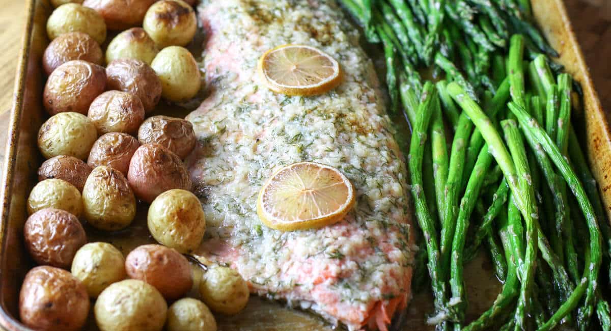 Sheet Pan Garlic Butter Salmon, Asparagus & Potatoes Sheet Pan - A complete meal on one pan - full of flavor and easy to put together. Can be customizable to fit your dietary needs for Whole30, Paleo, or Low Carb. #sheetpan #onepan #salmon