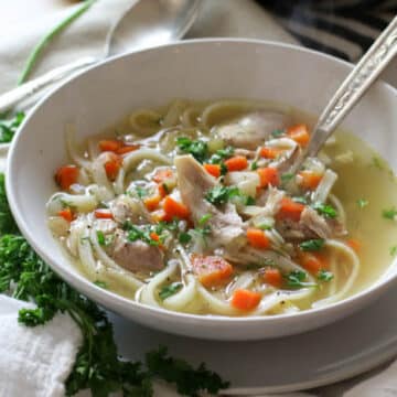 Nourishing Chicken Noodle Soup (Gluten Free, Paleo suggestions!) - Nourishing and full of detoxifying properties, this Gluten-Free Chicken Noodle Soup is made easily with just 8 ingredients. Make this grain-free (paleo, keto, low-carb) and use vegetable noodles. #glutenfree #chickennoodlesoup
