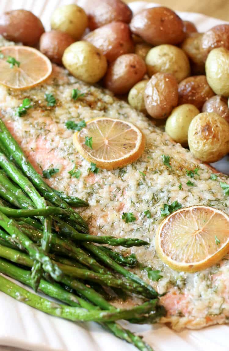 Garlic Butter Salmon, Asparagus & Potatoes Sheet Pan - A complete meal on one pan - full of flavor and easy to put together. Can be customizable to fit your dietary needs for Whole30, Paleo, or Low Carb. #sheetpan #onepan #salmon