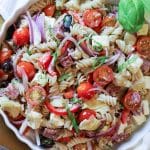 Healthy Gluten-Free Pasta Salad (Paleo, Low Carb & Whole30 options) -A hearty mix of gluten-free pasta, diced salami, tomatoes, artichoke hearts, feta cheese, all wrapped in an easy yet delicious zesty dressing. #healthy #pastasalad #whole30