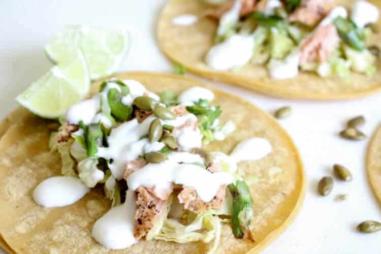 Seared Salmon Tacos (Low Carb, Gluten Free)Seared salmon with asparagus- scallion salsa and a drizzle of lime yogurt makes these Fish Tacos amazingly delicious. Ditch the tortillas and wrap in lettuce to keep it Low Carb. #lowcarb #glutenfree 