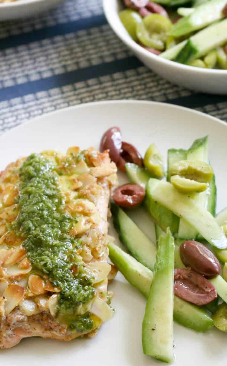 Almond-Crusted Trout (Low Carb, Paleo, Whole30) -A perfectly crunchy crust gives way to tender trout paired with delicious Cucumber Olive Salad makes a healthy 30 minute meal. #30minutemeal #whole30