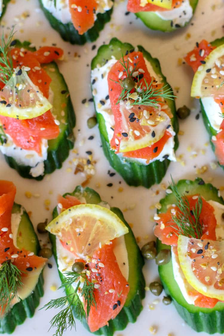 Everything Bagel Cucumber Bites with Smoked Salmon (Low Carb, GAPS, Primal) - Healthy smoked salmon on top of cream cheese topped cucumber slices and finished off with Everything Bagel Seasoning. A delicious, super easy, 15 minute, low-carb appetizer. #lowcarb #appetizers #smokedsalmon