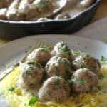 Oven-Baked Swedish Meatballs (Paleo, Whole30) - These Paleo Swedish Meatballs are just as satisfying as the original comfort food but without the gluten or dairy. They come together easily, baked to perfection in the oven, and then smothered in the delicious gluten-free gravy. #whole30 #meatballs