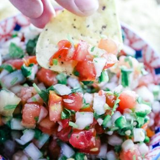 Fermented Tomato Salsa - Fermented Tomato Salsa is a tangy and gut-healing version of Pico de Gallo. With only 5 ingredients and naturally Paleo, Whole30, and Low Carb, this will be your favorite condiment all season long. #ferment #paleo