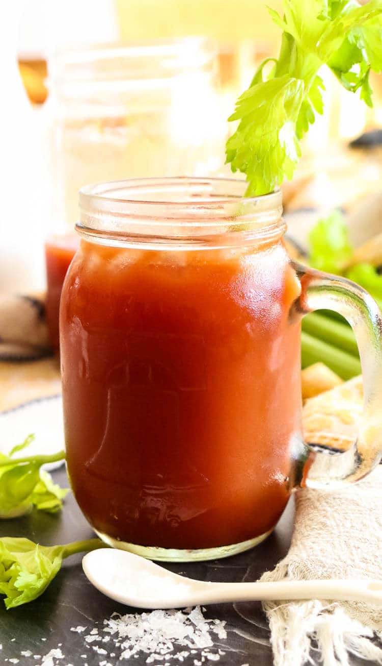 How to Make Homemade Tomato Juice from Tomato Paste -Did you know you can easily make tomato juice out of tomato paste?  This easy homemade tomato juice recipe calls for sea salt and healthy fats for better nutrient absorption. It's naturally Paleo, Whole30, and GAPS compliant. #tomatojuice #homemade #paleo 