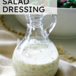 house salad dressing in a glass dressing jar.