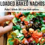 Healthy loaded baked nachos on a sheet pan