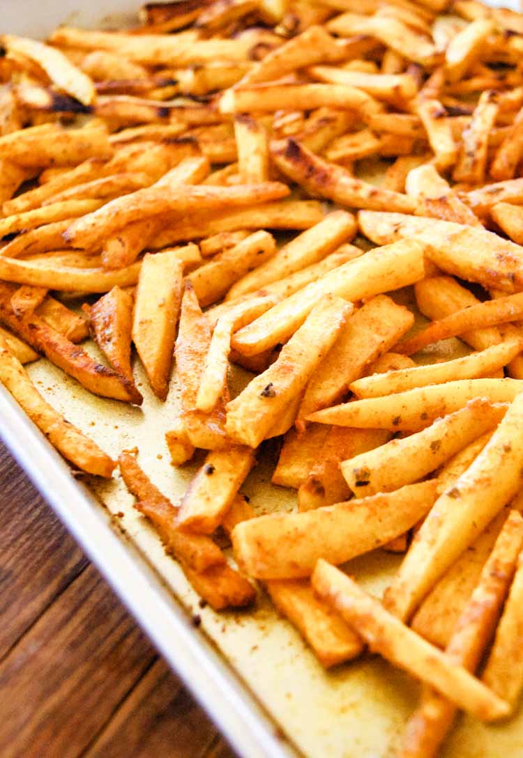 Oven baked sweet potato fries on a baking sheet