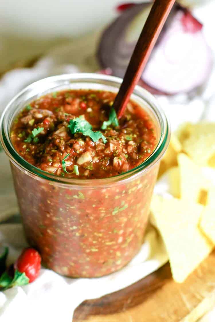 Blended salsa with cilantro garnished on top
