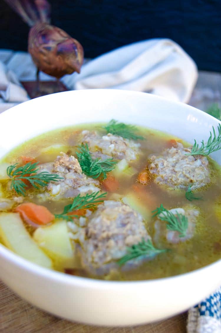 Meatball soup with potatoes, chicken meatballs, carrots and fresh dill