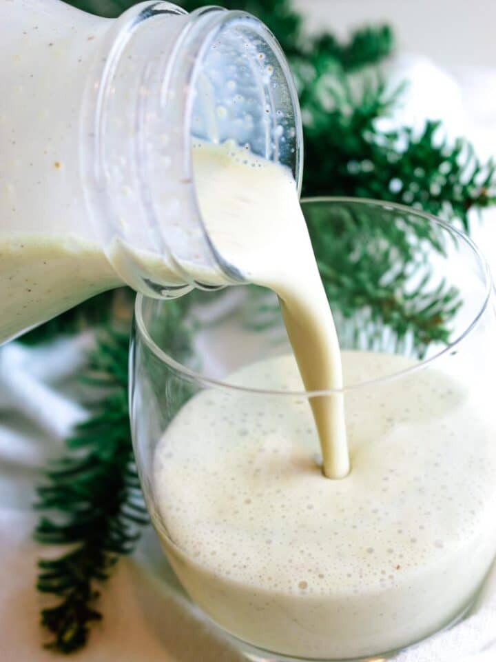 Eggnog poured from bottle into a glass