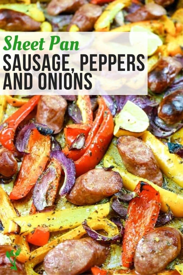 Sausage, peppers, and onions on a sheet pan in the oven