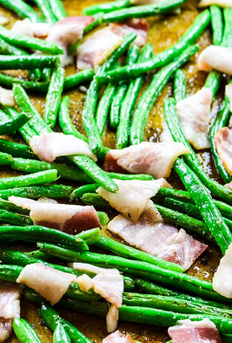 Green beans on a sheet pan with added bacon