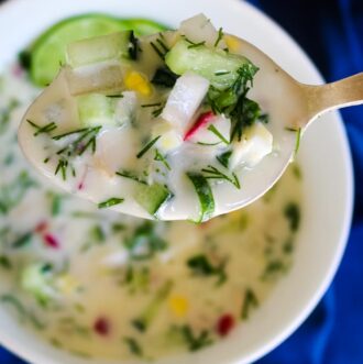 Okroshka in a bowl and spoon