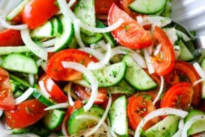 Tomatoes, cucumbers, and onions with fresh dill