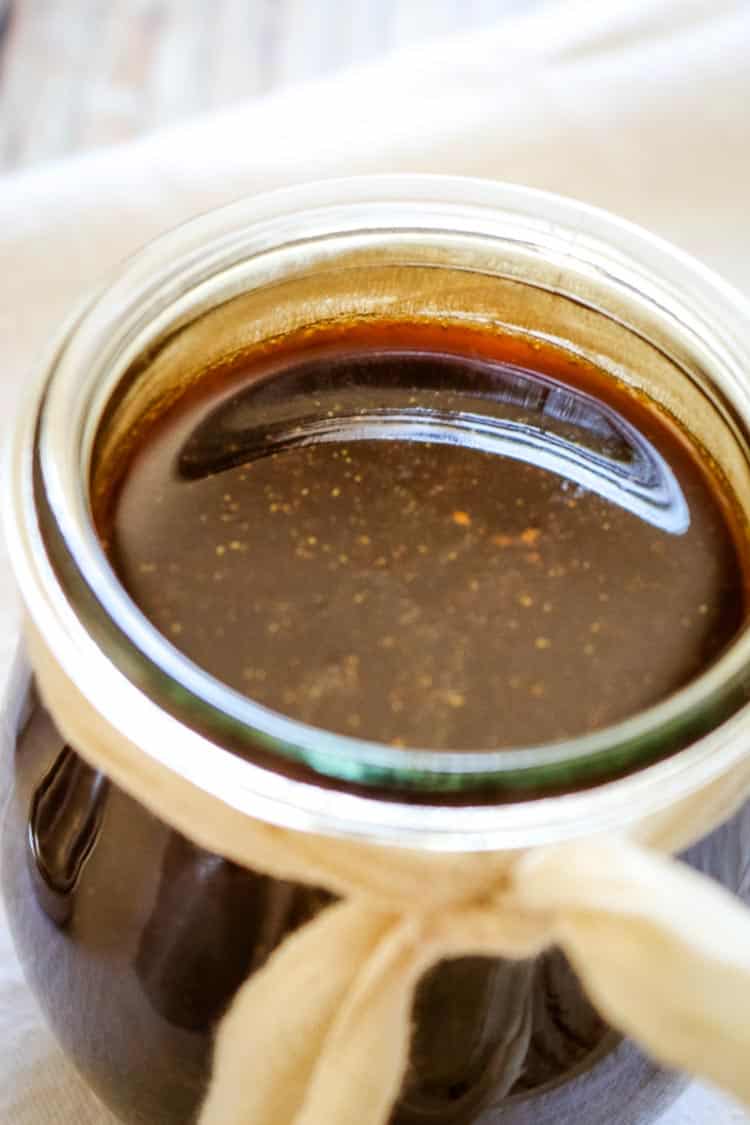 Healthy worcestershire sauce in a small jar with white background
