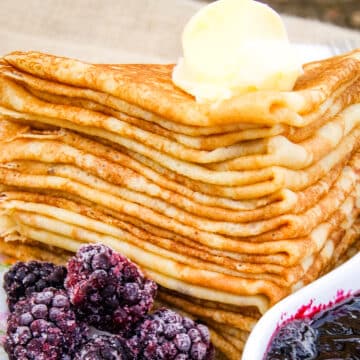 Stack of gluten free crepes with butter