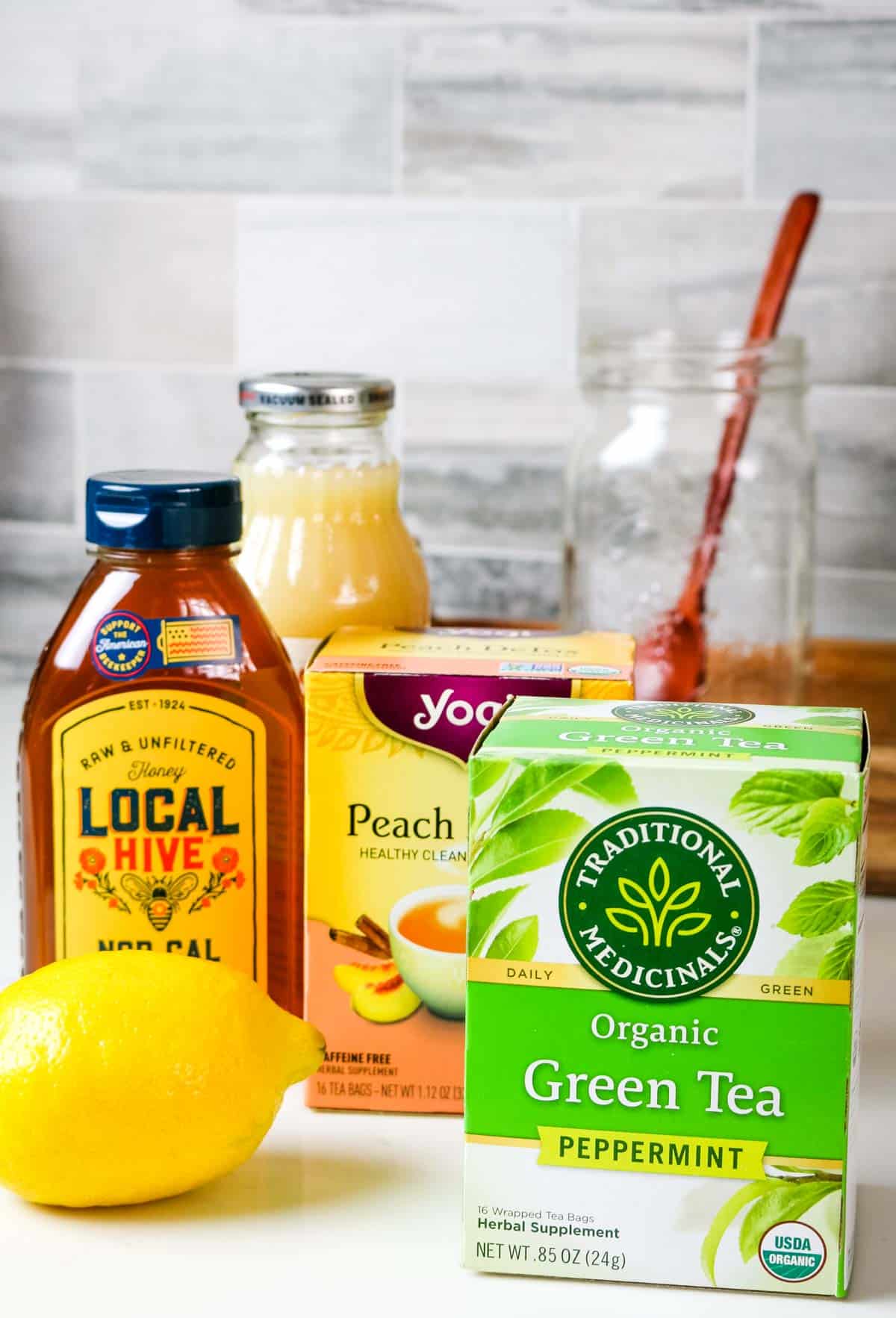 Ingredients for Honey Citrus Mint Tea: organic green tea, peppermint tea, peach detox tea, lemon, and honey