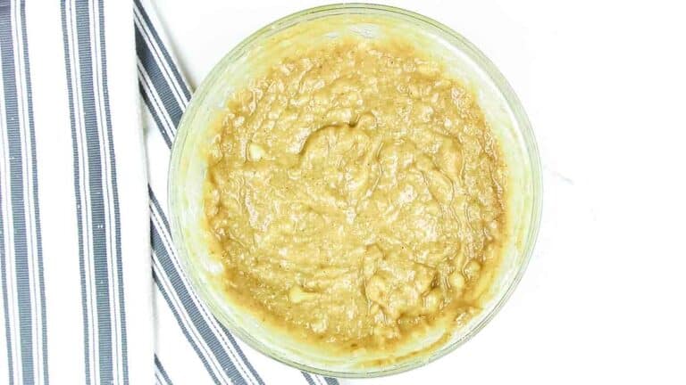 Added sweetener and coconut oil to banana bread batter.