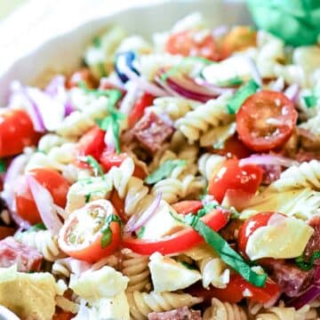 white bowl with cold pasta salad inside