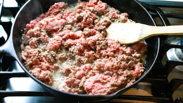 browning taco meat in cast iron skillet