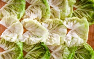a flatlay of cooked cabbage leaves cooked and cored