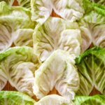 Board of flat cooked cabbage leaves