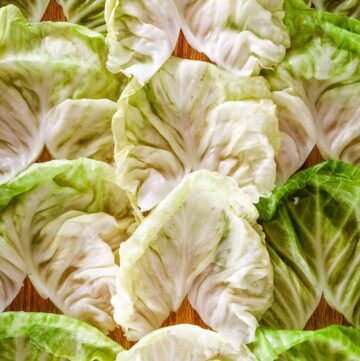 Board of flat cooked cabbage leaves