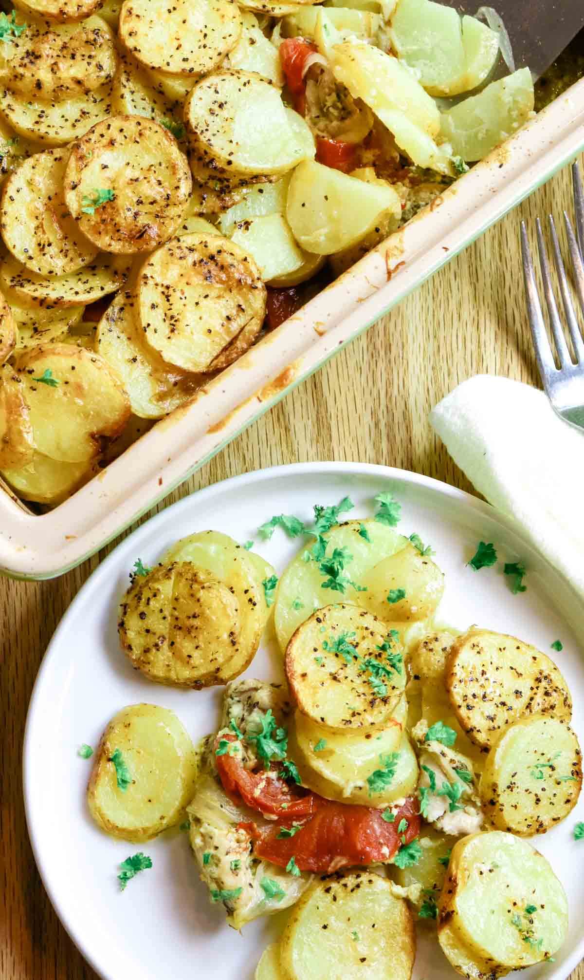 white plate of potatoes and casserole dish to the side