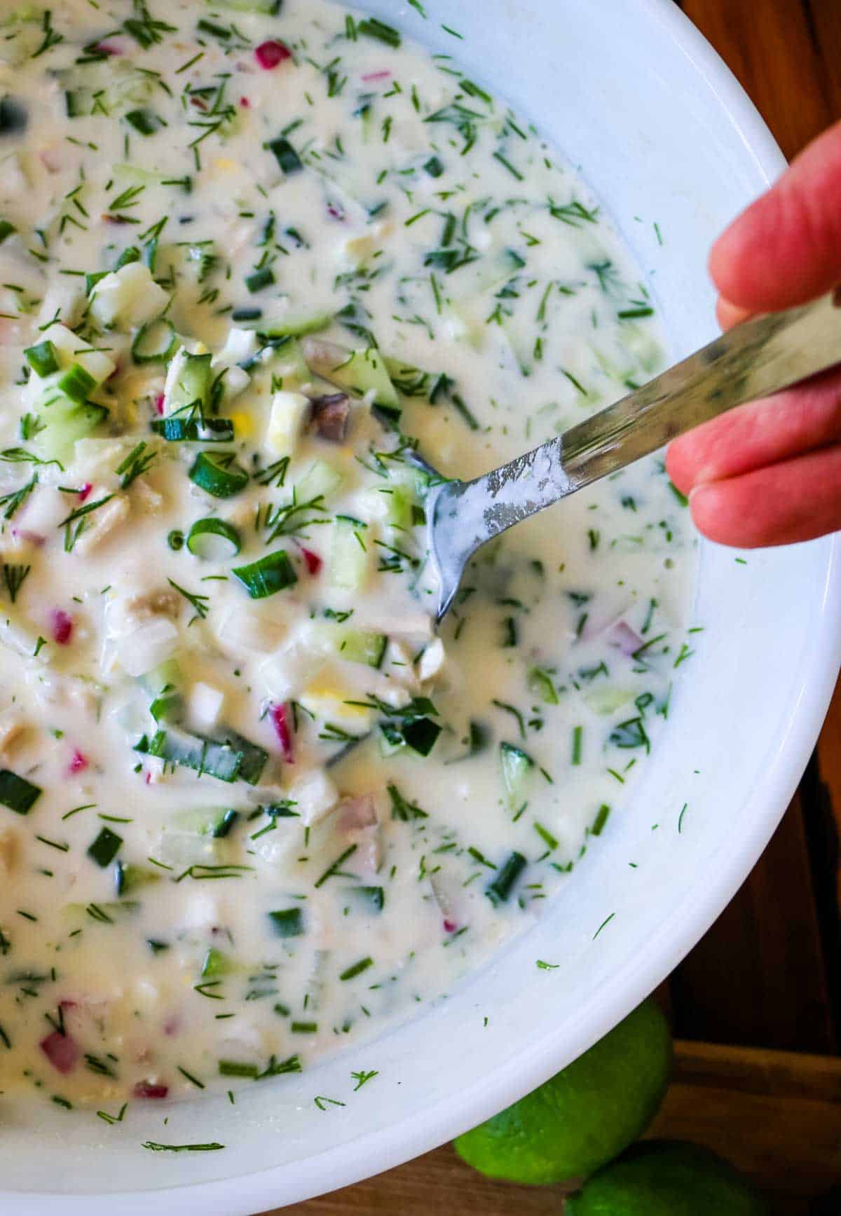 Okroshka in a bowl with ladle