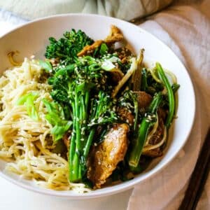 spicy pork with veggies over ramen