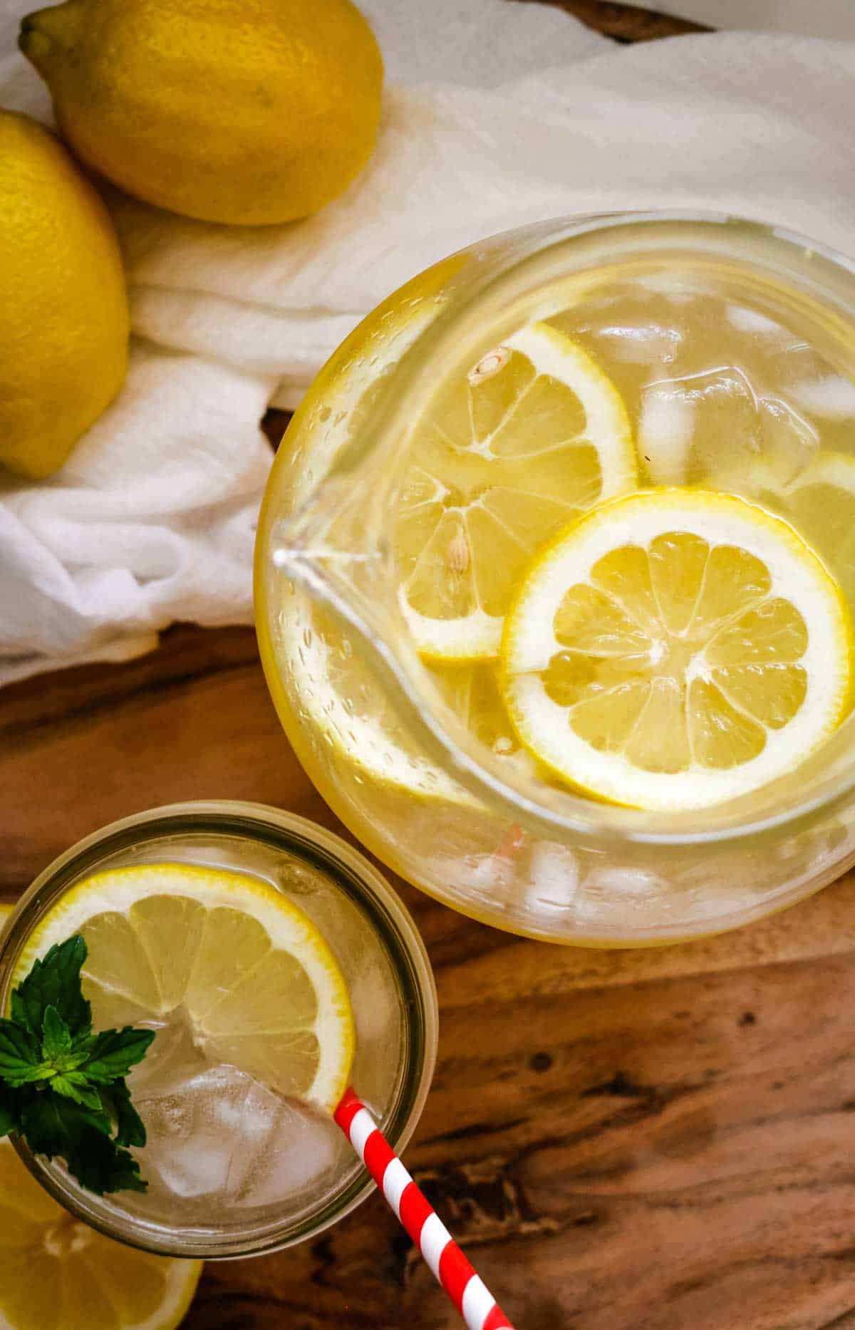 overhead shot of homemade lemonade with sliced lemons.